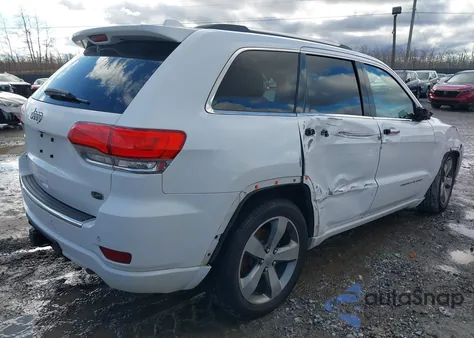 2014 Jeep Grand Cherokee Overland z USA, uszkodzony, nr VIN 1C4RJFCG5EC382161